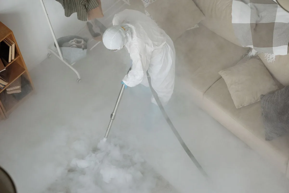 Biohazard cleanup technician in protective equipment, Harrisburg, OR